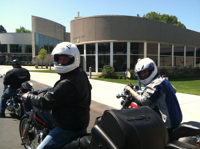 Ellen and Frank wait patiently as Jim's Harley refuses to start